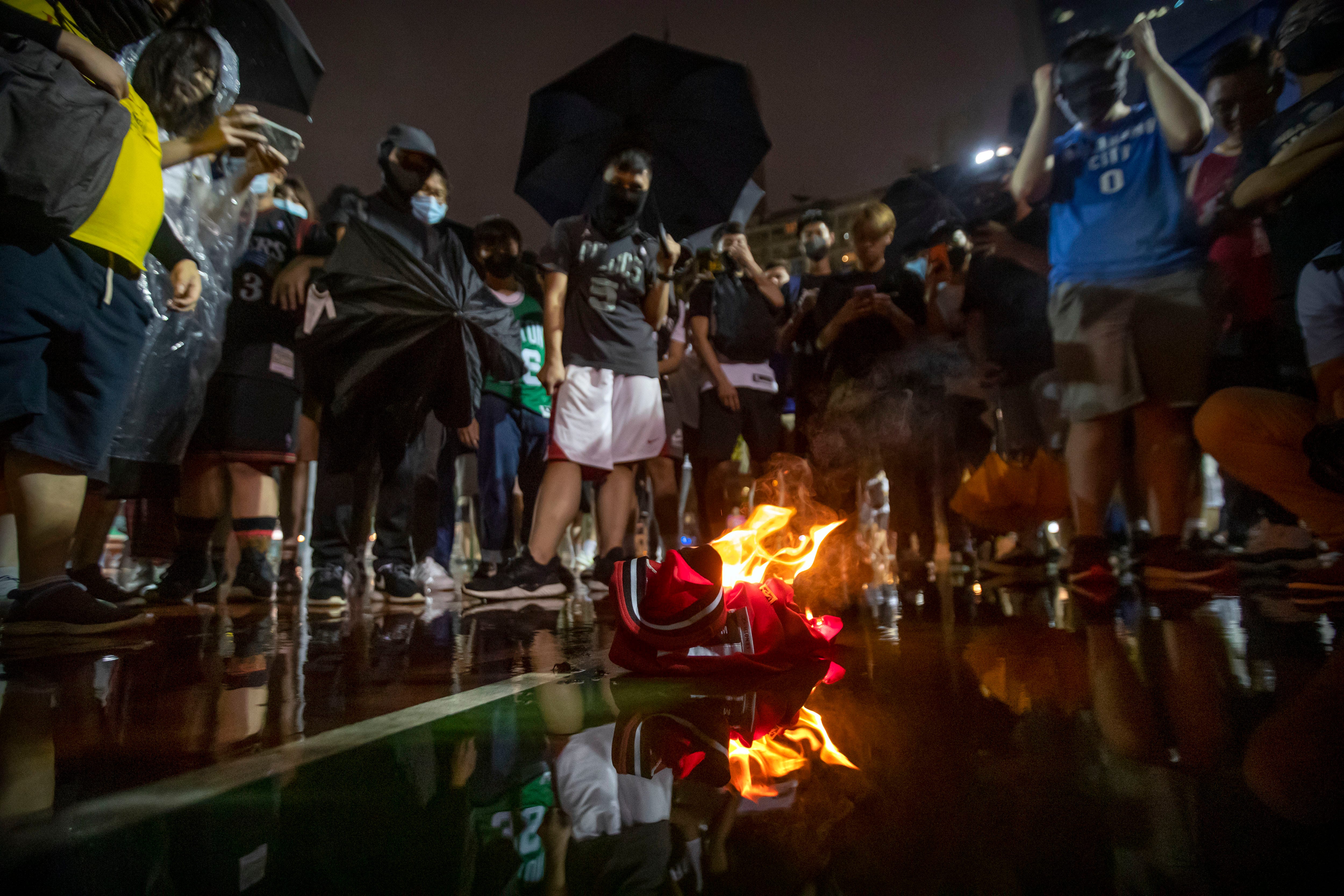 fans burning lebron jersey